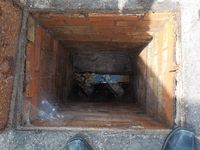 Displaced drain chamber